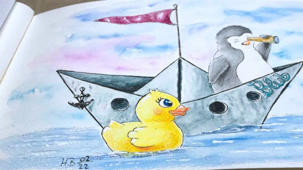 Pinguin im Papierboot und eine Quietscheente